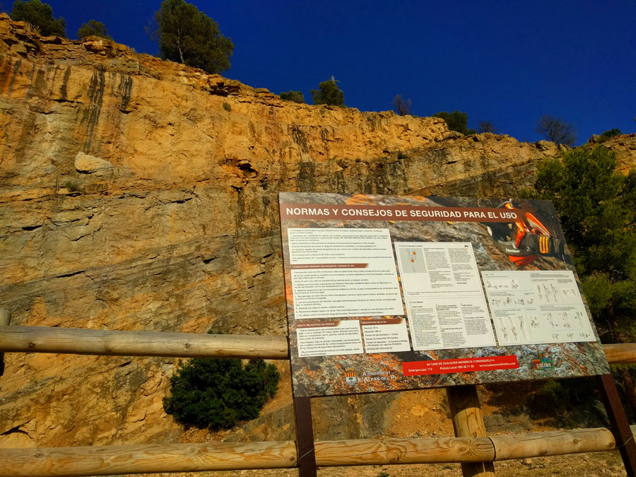 Poster with the via ferrata in the background 