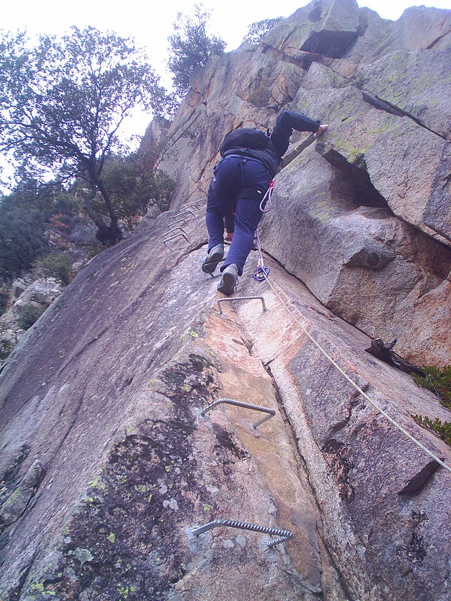 We go up making use of the cracks in the wall 