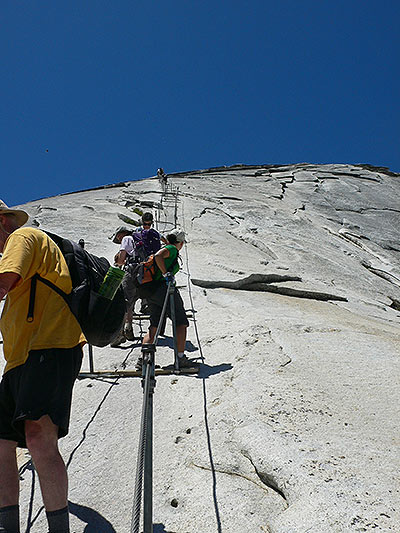 Starting the hike -we soon realize how slippery and vertical the rock is- 