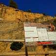 Poster with the via ferrata in the background 
