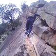 We go up making use of the cracks in the wall 