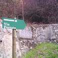 Sign post of the route from the road 