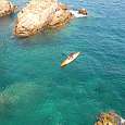 A kayaker in the Cala del Molí 