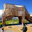 A big wooden cow marks the beginning of the path -its inside is a games zone and its tongue a long slide- 