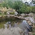 Mini poza en el río Angoustrine que cubre hasta la cintura 